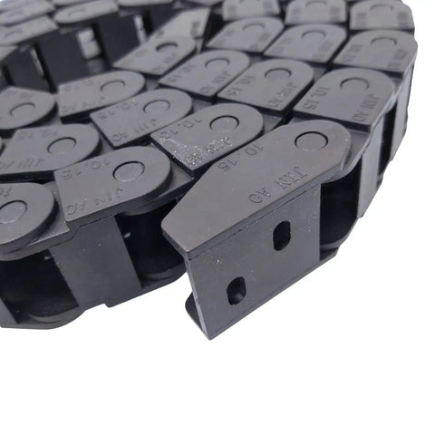 Close-up of a long black nylon cable drag chain wire carrier 2M 2000mm 10x15mm internal size beefed up reinforced PA66 for CNC machines.