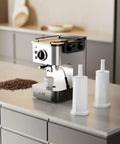 Top Shelf 6 Pack Water Filter Replacements For Breville Espresso Machines Clearing Sticky Scale Buildup Compatible With Barista Pro Touch Oracles Dual Boiler For Smooth Daily Sippin next to espresso machine and coffee beans.