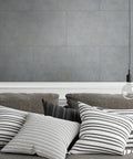 Faux Stone Peel And Stick Wall Panels 11.5 Inch By 23.5 Inch Pack Of 10 Realistic Textured Stone Look behind a modern couch and pillows