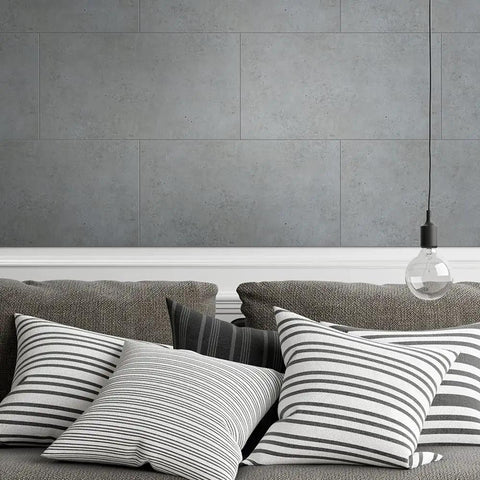 Faux Stone Peel And Stick Wall Panels 11.5 Inch By 23.5 Inch Pack Of 10 Realistic Textured Stone Look behind a modern couch and pillows