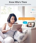 Woman using tablet with Alexa device displaying outdoor security camera 2K QHD with color night vision for crisp color footage.