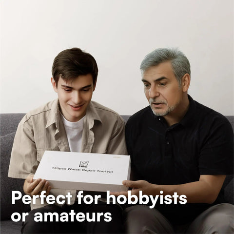 Two people holding a watch repair kit box labeled '155 Piece Watch Repair Tool Kit' perfect for hobbyists or amateurs.