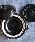 Top view of Hase En Kamado San Earthenware Rice Pot For Gas Stoves With Double Lid, showing interior and open lids.