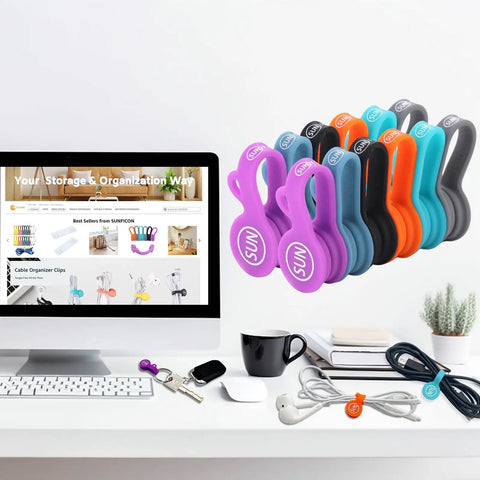 Magnetic Cable Clips Set Of 12 for Cable Management and Organization shown in multicolor by a desk with computer and keys.