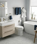 Modern bathroom with Dope 7 Piece Bathroom Hardware Set In Brushed Nickel Stainless Steel, featuring towel bars and toilet paper holder.