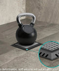 Top Shelf Stainless Steel Shower Drain Hair Catcher on tiled floor, designed to stop bathroom clogs in drains under four inches.
