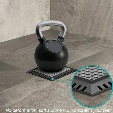 Top Shelf Stainless Steel Shower Drain Hair Catcher on tiled floor, designed to stop bathroom clogs in drains under four inches.