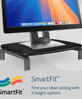 Adjustable Gray Ergonomic Monitor Stand With Three Height Settings Holds Up To Forty Pounds Laptop And PC Riser on desktop