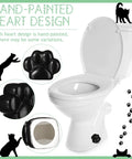 Decorative Paw Print Toilet Bolt Caps Black 2 Pack Cute Bathroom Screw Covers Sleek Matte Finish on a white toilet.