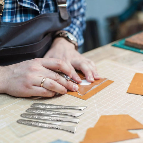 8 Piece Leather Cutting Tool Set With Sharp Skiving Blades And Comfortable Handles for Leatherworking on craft table