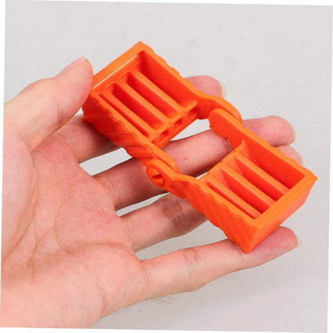 Four Pack Ratchet Band Clamp Blocks for Woodworking in orange color held in hand, showing size and grip details for carpentry projects.