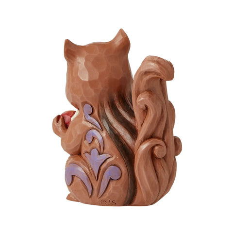 Rear view of Chipmunk Holding a Nut Mini Figurine From Jim Shore Heartwood Creek Folk Art Collection, handcrafted in multicolor resin.