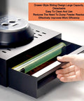 Heavy Duty Espresso Knock Box Drawer Featuring Shock Absorbing Removable Tap Bar And Grip Lock Base Designed To Save Counter Space And Keep Your Daily Brew Routine Zero Mess In Black, showing drawer opening.