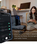 Wi Fi Smart Surge Protector Power Strip Featuring Four Independently Controlled Grounded Outlets Quick Charge Usb Ports Plugging In Is A Breeze Compatible With Alexa And Google Home Fully Adjustable Gray, smartphone with app in hand, woman planning settings, cozy home setting.
