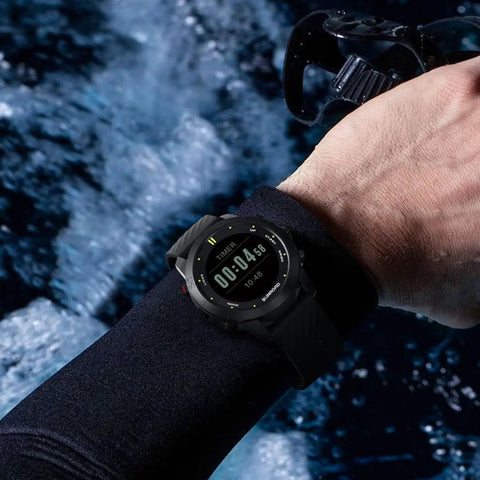 Workhorse Scuba Diving Computer Watch D3 With 100m Depth, displaying dive time and depth in ocean setting on a diver's wrist