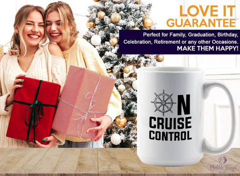 White 15oz Coffee Mug For Boat Lovers On Cruise Control featuring helm design, with gift boxes and holiday decor in background.
