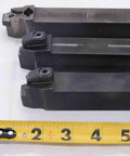 Three Piece Lathe Turning Tool Holder Set Featuring One Inch Square Shank, black steel tools, arranged with measuring tape.