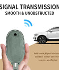Premium Suede Leather Key Fob Cover For Tesla Model X in hand showing signal transmission capability.