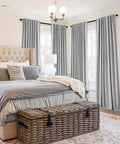Light Grey 100 Percent Blackout Curtains, 2 Panels Set, 72 Inches Long by 52 Inches Wide Per Panel, shown in a bedroom setting.