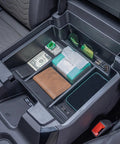 Full Size Console Tray With 2-Layer Storage For 2022-2026 Silverado Sierra 1500 And 2024-2026 2500HD/3500HD showing organized items