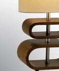 Close-up of Rhythm Rustic Bentwood Table Lamp with natural beige shade, featuring stacked bentwood ovals in warm walnut finish.