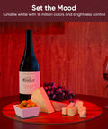 Color Changing BR30 Wi Fi Smart Bulb With E26 Base, creating ambiance with wine and cheese on the table