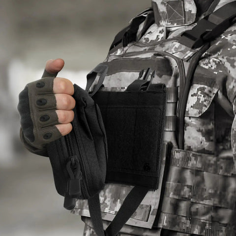Person demonstrating Tactical EMT Pouch Upgrade IFAK Tear Away First Aid Kit attached to tactical vest.