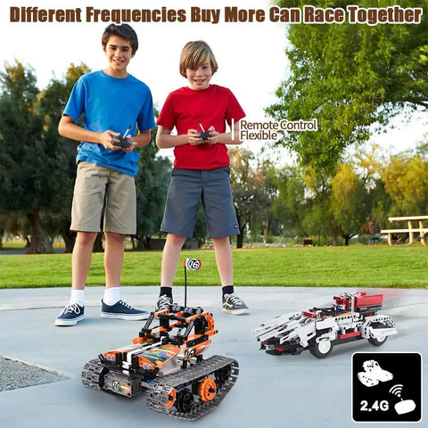3-In-1 STEM RC Building Kit With Tracked Car, Robot, And Tank, 2.4GHz Rechargeable Remote, Kid-Approved Engineering Toy Set For Ages 8 To 14, 392 Pieces Of Hands-On Science Fun, two boys using 2.4G remotes to race RC builds outdoors