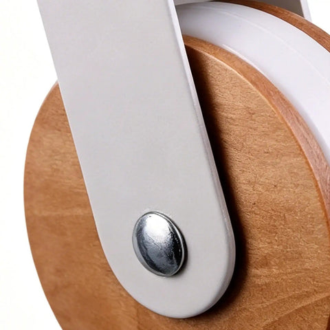 Close-up of Heavy Duty Casters 4 Pieces M8 Threaded Heavy Duty Silent Replacements with wooden wheel and metal pin.
