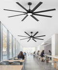 84 Inch Industrial Ceiling Fan With Lights installed in a modern cafeteria, featuring large black fan with 8 reversible aluminum blades.