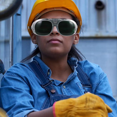 Young woman wearing Two Piece Electric Welding Glasses And Tough As Nails Safety Goggles for optimal safety and glare reduction.