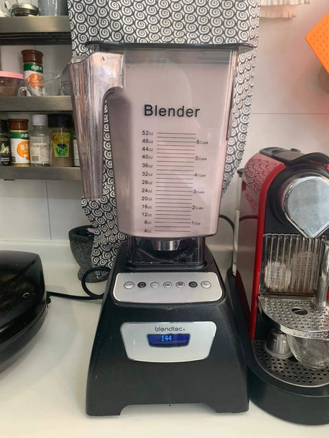 Replacement Parts for Blendtec Jar 90 Oz 3 Quart Premium Pro Grade Blender Jar With Stainless Steel Blade on kitchen counter.