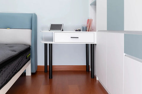 White desk with black metal legs, showcasing 30 Inch Adjustable Metal Desk Legs Set Of 4, ideal for DIY computer desks.