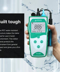 Person holding Value Series Pro Grade Portable Handheld pH Meter Kit With Auto Calibration, Multi Point Slope Data Display, IP57 rugged case