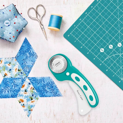 Headley Tools rotary cutter set with turquoise handle, 45mm blade, A3 cutting mat, quilting ruler and extra blades