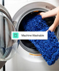 Top Shelf Commercial Dust Mop And Floor Sweeper With Adjustable Handle being placed in washer for cleaning.