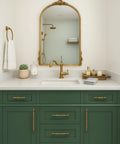 Elegant bathroom with green vanity and 10 Pack 3 Inch Antique Brass Cabinet Pulls, Vintage Zinc Alloy Handles For Kitchen Drawers.