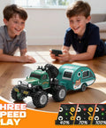 Two boys playing with Mini 1 64 Scale RC Truck With Detachable Trailer 2.4GHz Remote Control Rechargeable Battery on floor
