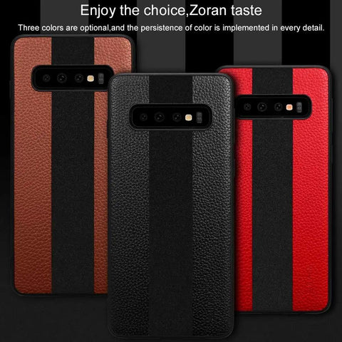 Three smartphone cases with textured leather finish and vertical black stripe, available in black, brown, and red, standing on display.