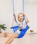 Child playing on Heavy Duty Kids Rope Swing Seat For Indoor And Outdoor Play With Secure Hooks And Straps 440 lb Capacity