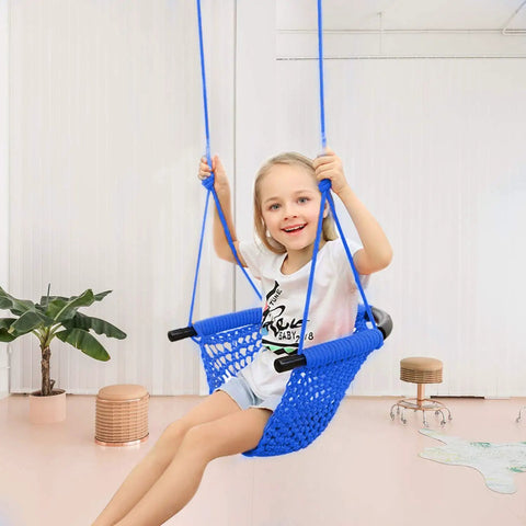 Child playing on Heavy Duty Kids Rope Swing Seat For Indoor And Outdoor Play With Secure Hooks And Straps 440 lb Capacity