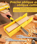 4 In 1 Miter Box And Saw Set With A 12 Inch Box And 3 Interchangeable Blades Japanese Pull Saw For Wood Drywall And Soft Metal Cutting Ideal For DIY And Home Projects Pro Grade in use on a wooden workbench