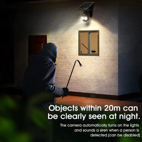 Wireless Outdoor Solar Security Cam With 360 Degree PTZ And Spotlight illuminating intruder at night