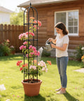 Woman watering flowers on Beefy 76 Inch Weather Resistant Rustproof Metal Garden Trellis For Climbing Plants, in a backyard setting.