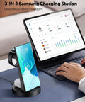Must Have 3 In 1 Wireless Charging Station for Galaxy Watch, Buds, and Phones on desk next to tablet