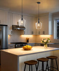 Kveosv 2 Pack Kitchen Island Pendant Lights, 8" Clear Glass Shade Black Modern Farmhouse Industrial Pendant Light Fixtures above kitchen island.