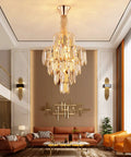Lit Gold Finish Modern Crystal Chandelier, 5-Tier 7-Light Round Pendant Ceiling Light With Adjustable Chain, 15.7 Inch Diameter in living room