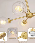 Gold Globe Giant Pendant Chandelier 5 Light Sputnik Ceiling Fixture with dope clear glass shades, close-up view of details