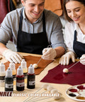 Full Grain Leather Crafting Kit With Genuine Cowhide Tools And Paint Set For DIY Wallet Making shown in use by two people at a table.