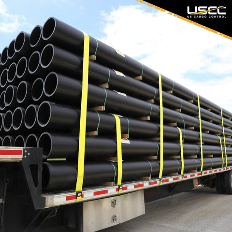 196 Pack 2 In X 50 Ft Ratchet Straps With Flat Hooks Heavy Duty Workhorse Polyester Webbing Tie Downs 10,000 Lbs Break Strength securing black pipes on flatbed trailer.